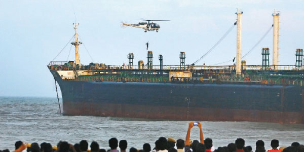 Tap the ship invisible on the ground and the body of a worker at Ennore secluded shore